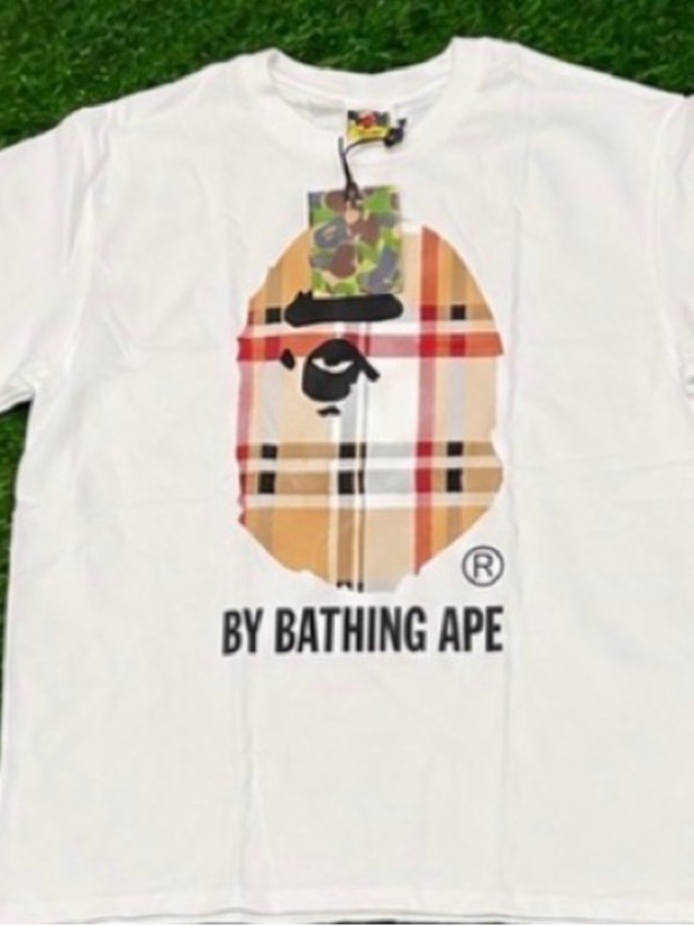 A Bathing Ape White Graphic Tee with Plaid Ape Logo